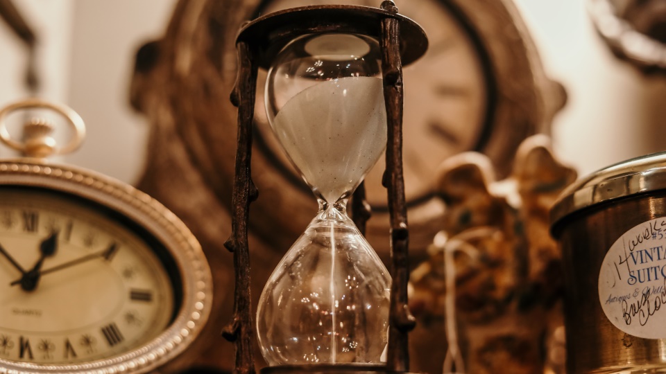 Hourglass and clocks